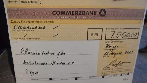 Scheck über 7000,- € von der Fa. SIEMAG TECBERG Scheck über 7000,- € von der Fa. SIEMAG TECBERG